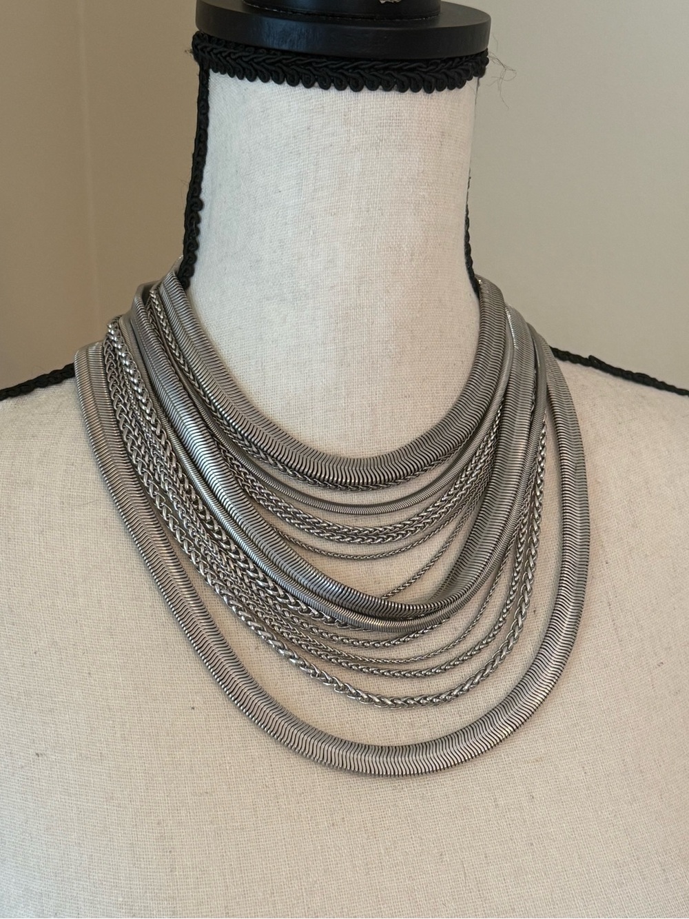 Multi-strand Kendra Scott silver necklace.
